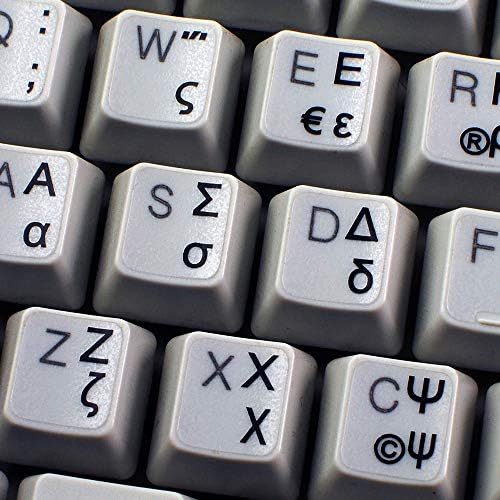 תוויות מקלדת יווניות עם כיתוב שחור על רקע שקוף לשולחן עבודה, מחשב נייד ומחברת